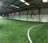Artificial grass outdoor space at Behan Lodge
