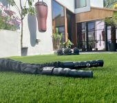 Artificial grass exercise area